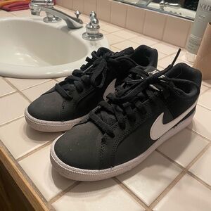 Nike Black Athletic Sneakers with White Label Detail